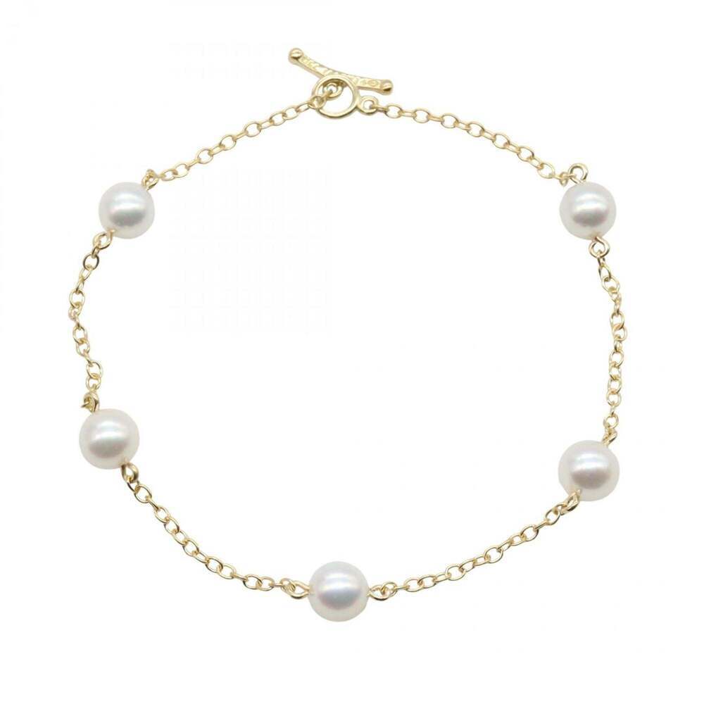 TIFFANY 18k Gold Pearl Charm Bracelet